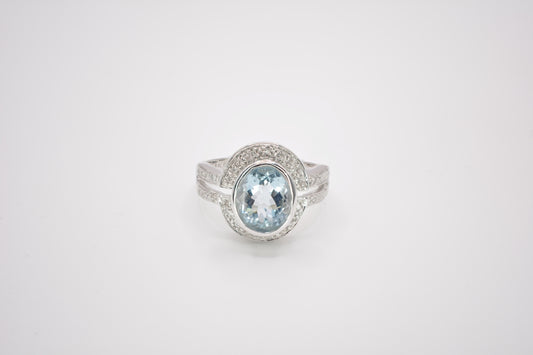 14K Aquamarine .17CTW Diamond Ring